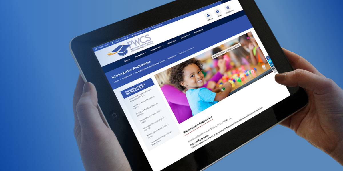image of an ipad being held with the Kindergarten registration page displayed on the iPad